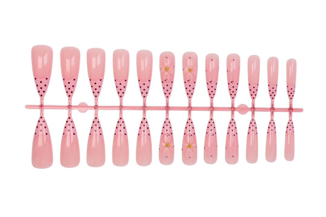 Artificial nail set with romantic flower and polka dot designs Kalsten