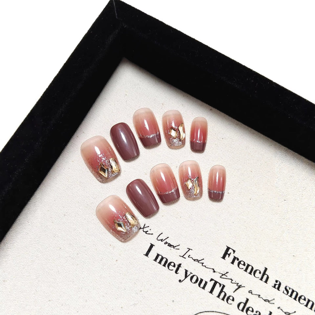Acrylic nails in elegant ombre design with glitter elements Kalsten