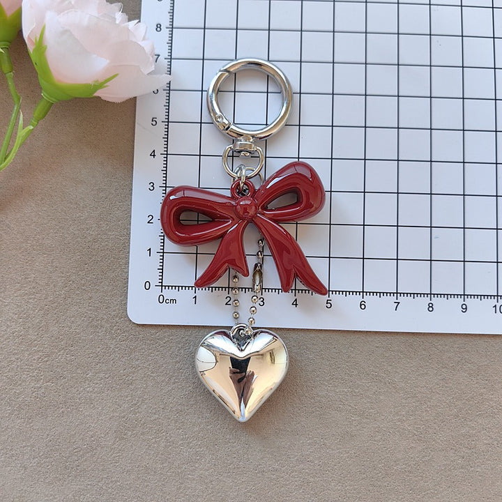 Keychain with bow and heart motif Kalsten