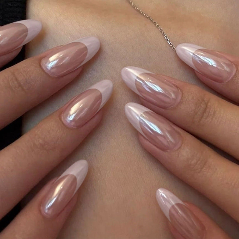 Acrylic nail set with elegant pointed shapes and glossy accents Kalsten