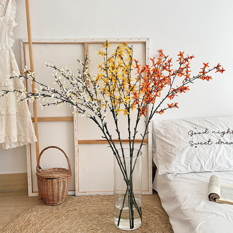Artificial flower branch with intricately detailed yellow flowers