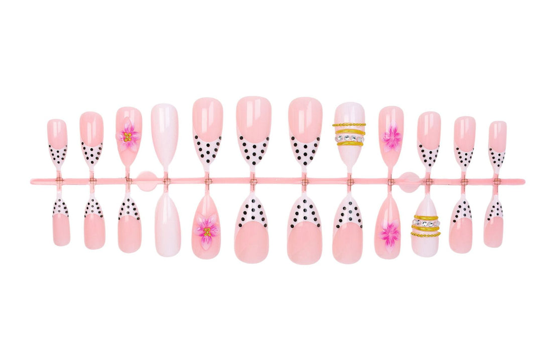 Acrylic nail set with romantic floral patterns and elegant glitter decorations Kalsten