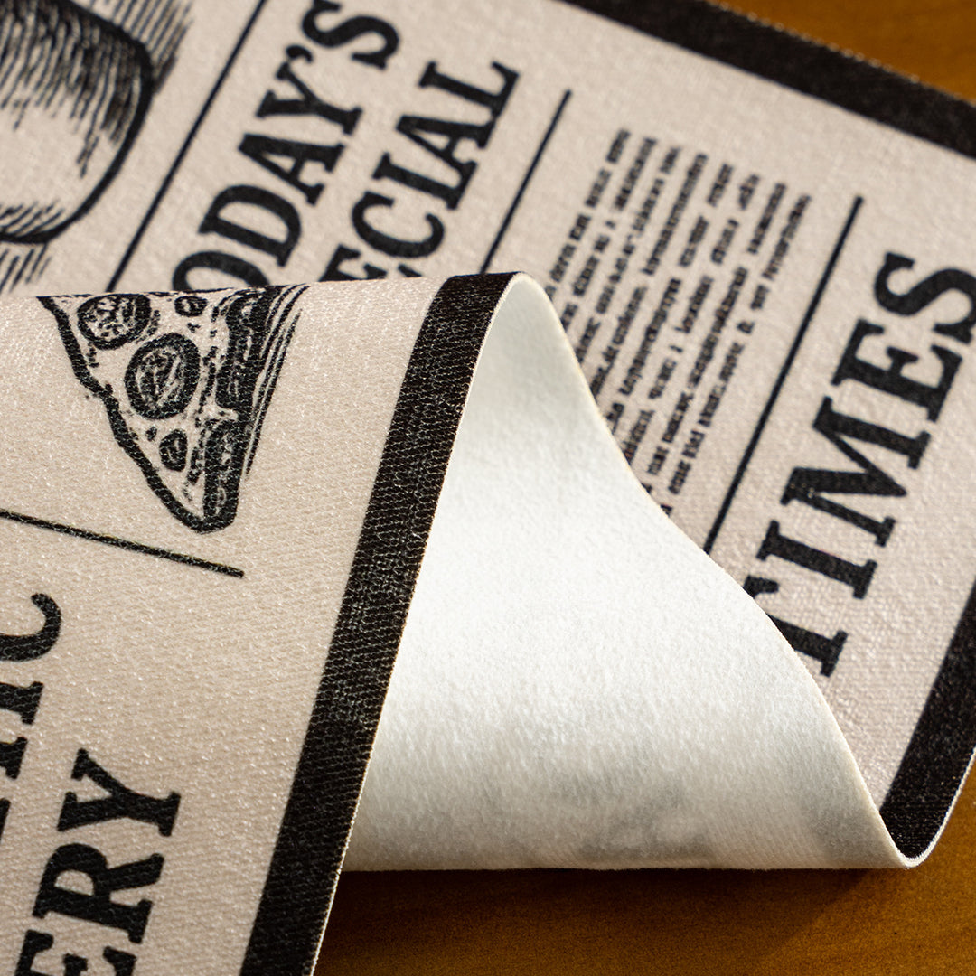 Coir doormat in newspaper layout with non-slip backing Kalsten
