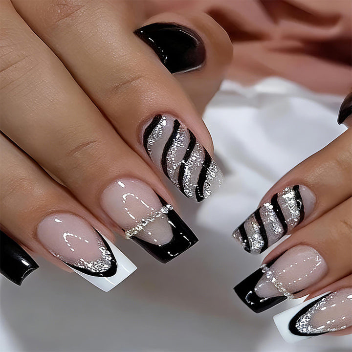 Elegant artificial nails with glitter and stripe accents Kalsten