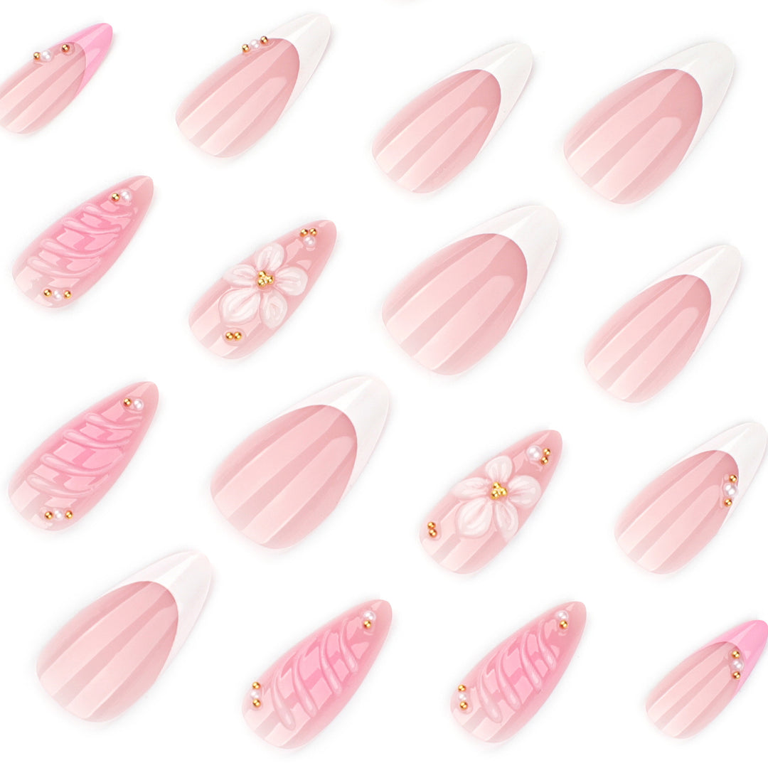 Artificial nail art with floral design and glitter accents Kalsten