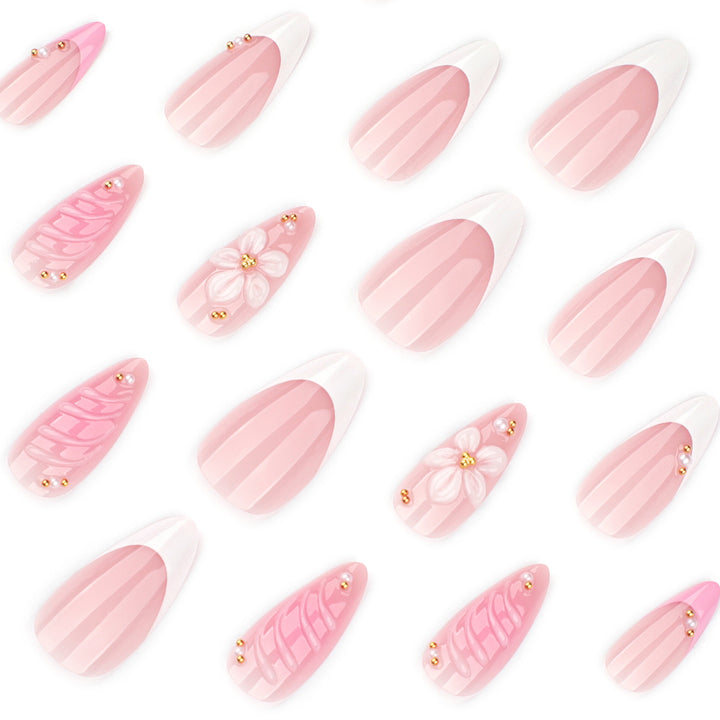Artificial nail art with floral design and glitter accents Kalsten