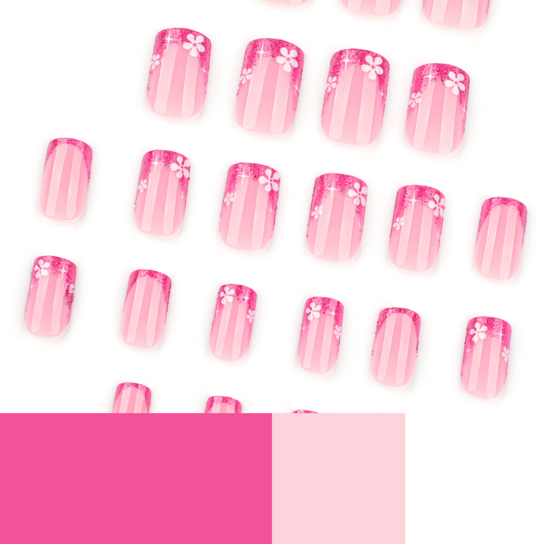 Artistic nail art with floral accent and glitter Kalsten
