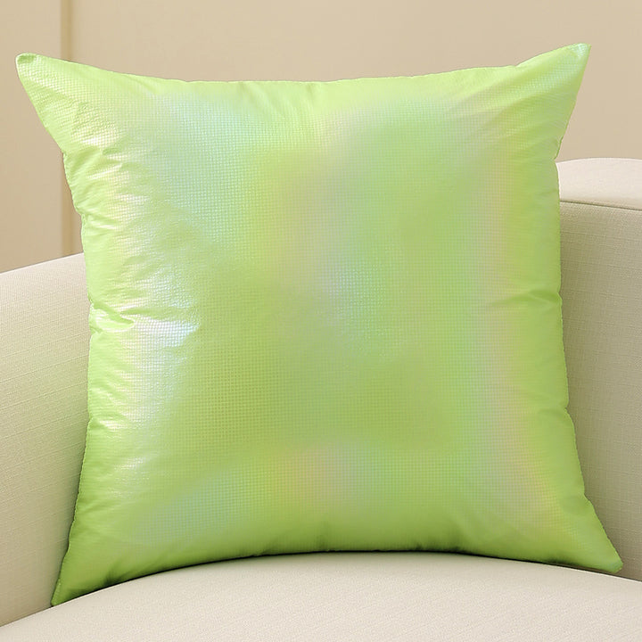 Square decorative cushion with delicate mother-of-pearl look and fine micro tuft structure