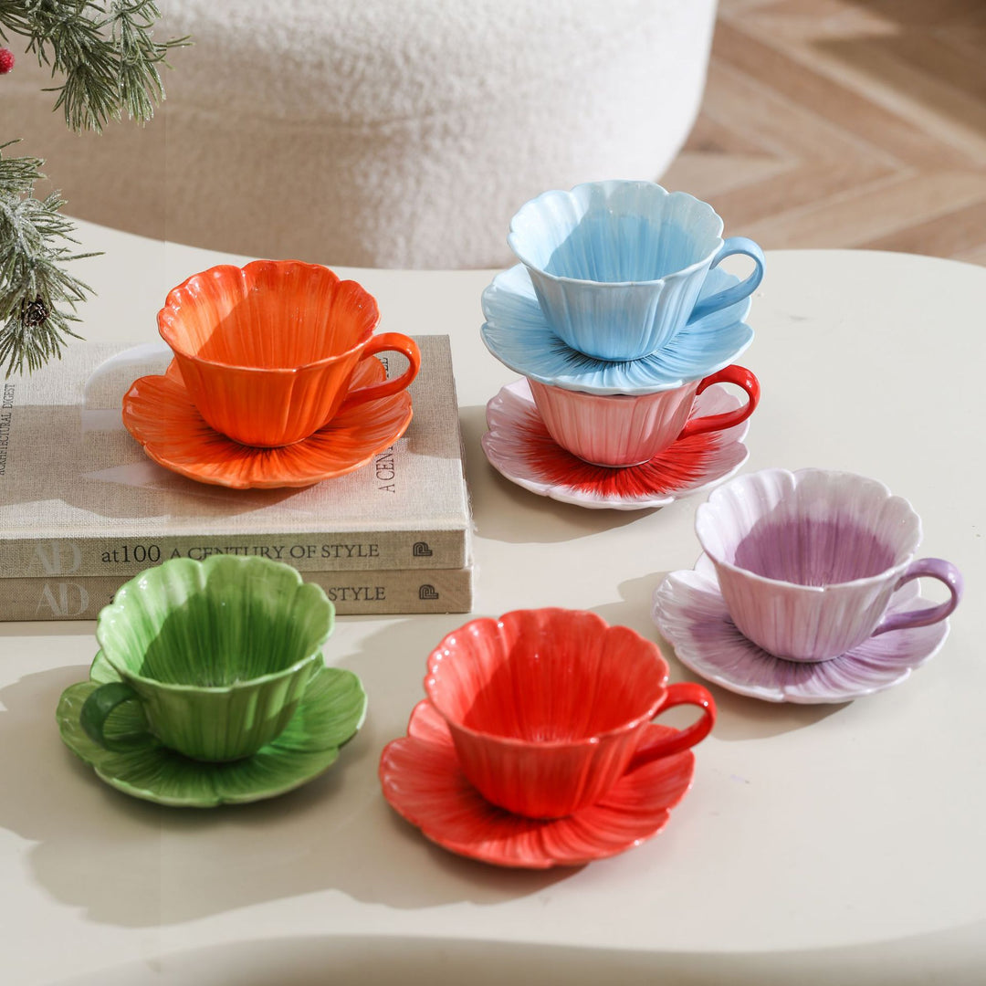 Ceramic mug with saucer in flower shape