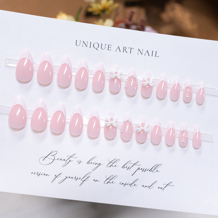 Decorative Press-On Nail Art with Bow Accents