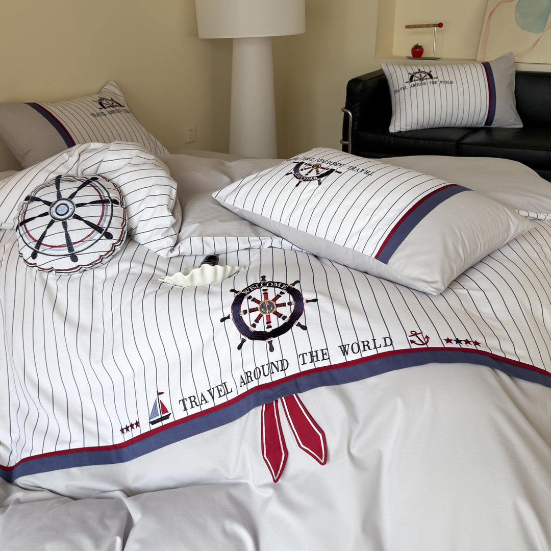 Maritime bedding set made of cotton satin with embroidered steering wheel and fine pinstripes