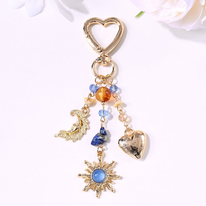 Keychain with Sparkling Sun Motif Kalsten