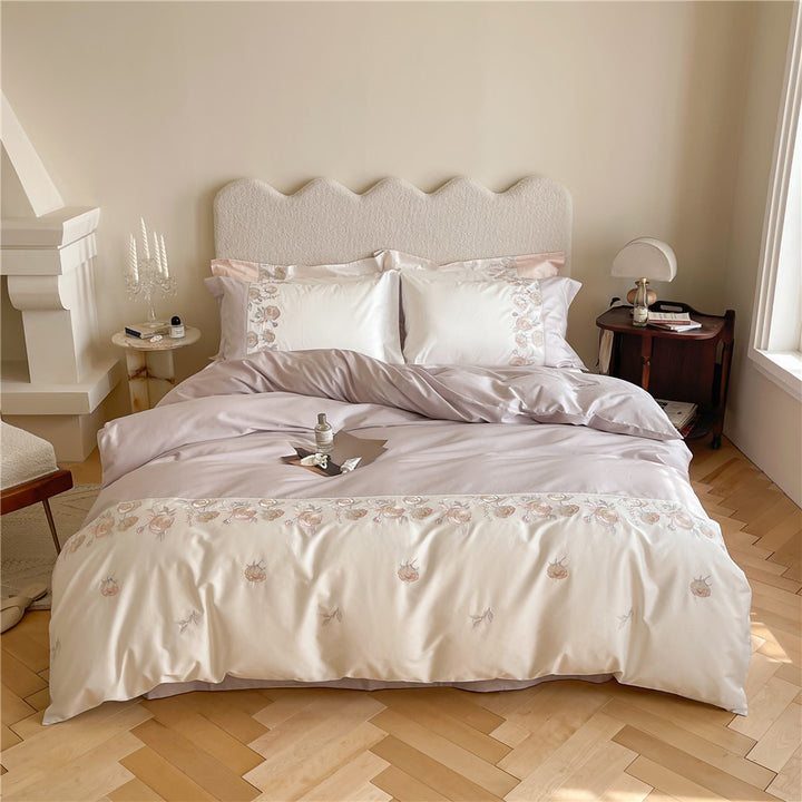 Premium bedding set made of cotton satin with floral border embroidery and reversible function