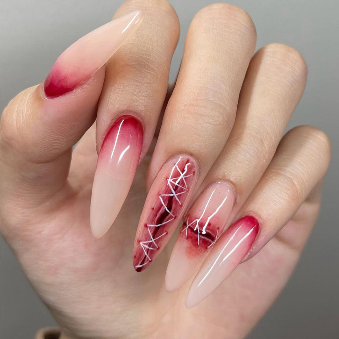 Creative Stiletto Nail Art with Blood Red Accents Kalsten