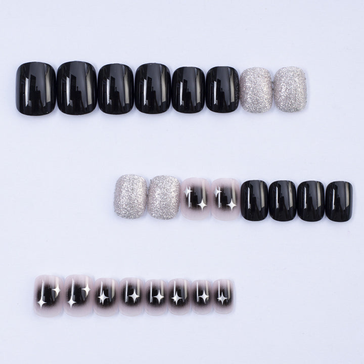 Artificial nails in elegant black with gloss and creative accents Kalsten