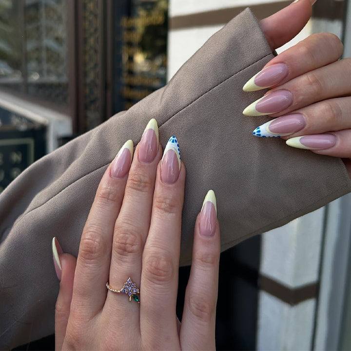 Artistic Stiletto Nail Design with Gradient Tips