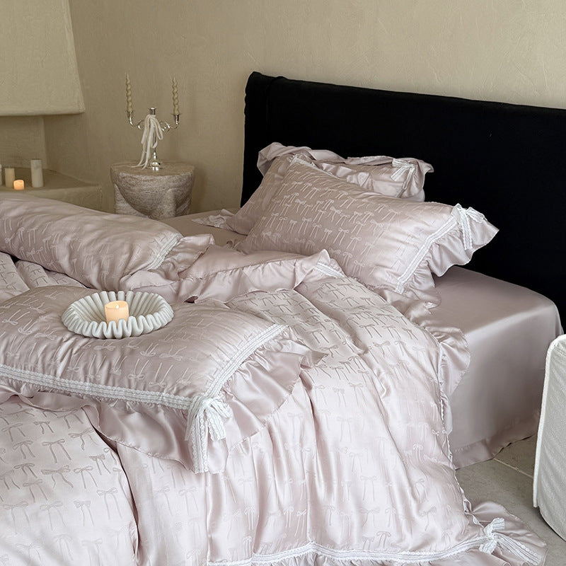 Luxurious satin bedding set with ruffles and fine bow jacquard