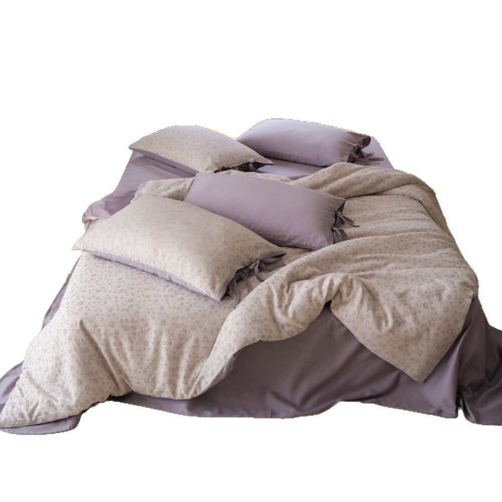 Luxurious bedding set with floral microprint percale and satin finish back