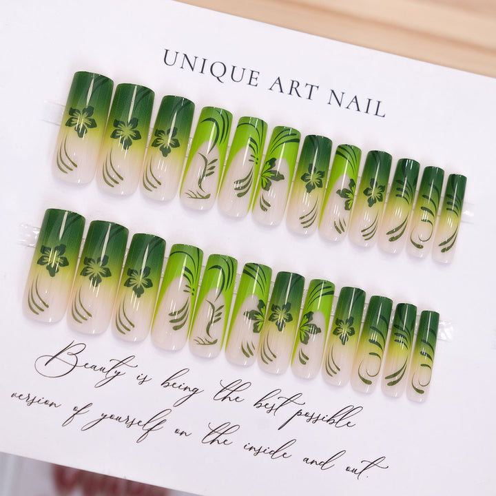 Artistic Long Stiletto Press-On Nails with Green Leaf Design