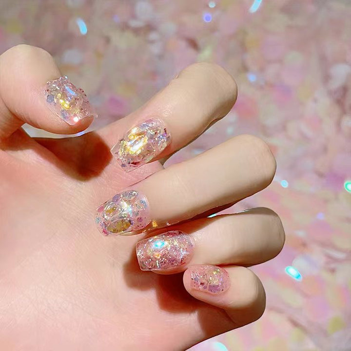 Artful nail tips with glitter accents Kalsten