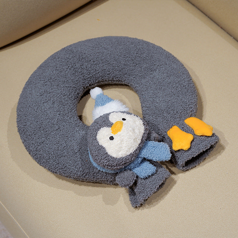 Ergonomic neck pillow travel pillow with cuddly penguin application