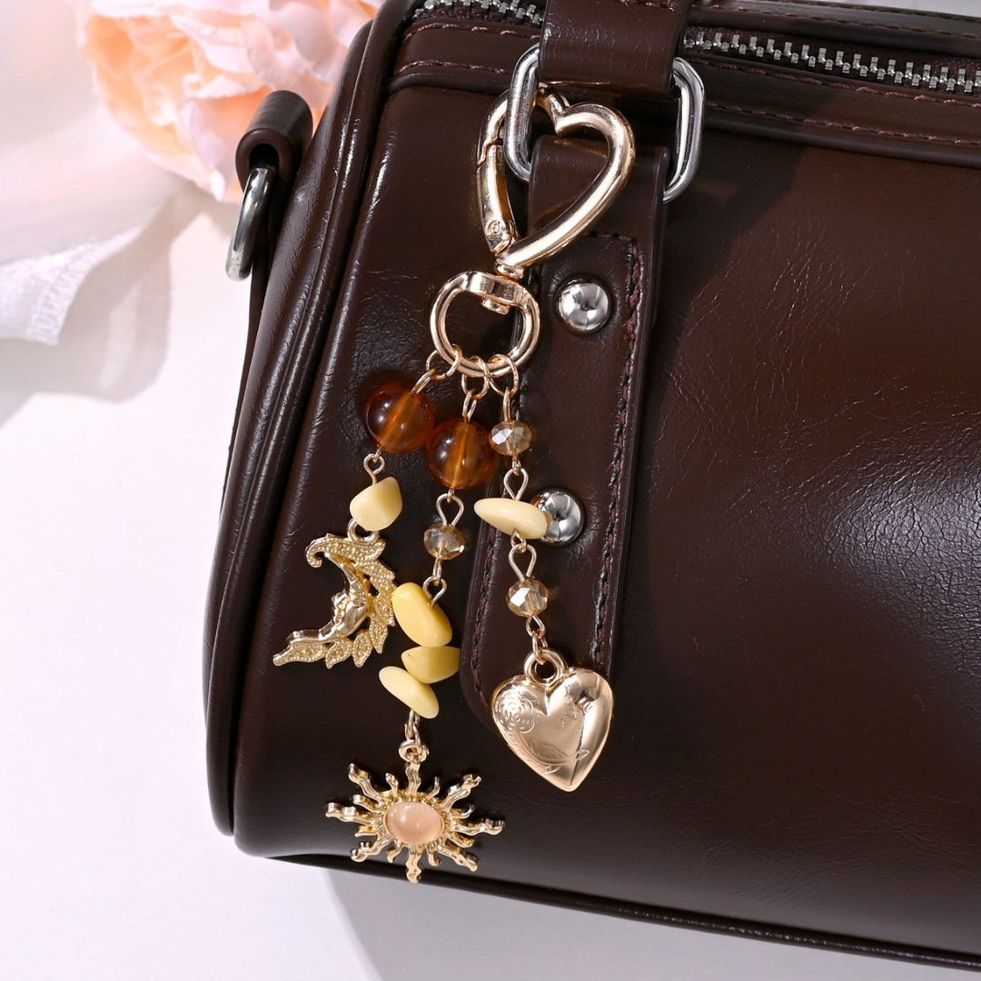 Keychain with Sparkling Sun Motif Kalsten
