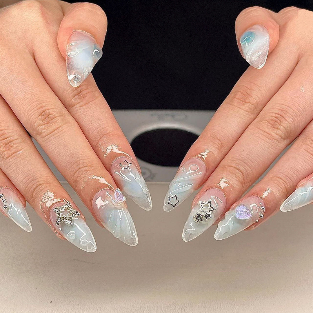 Artistic 3D Nail Extensions with Colorful Designs and Glitter Accents Kalsten