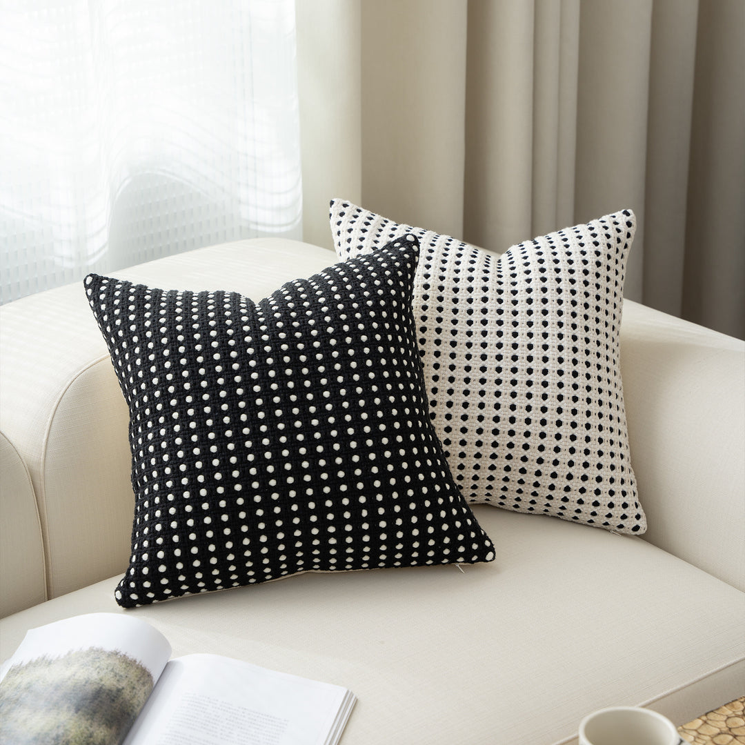 Woven decorative pillow with textured dot tufting