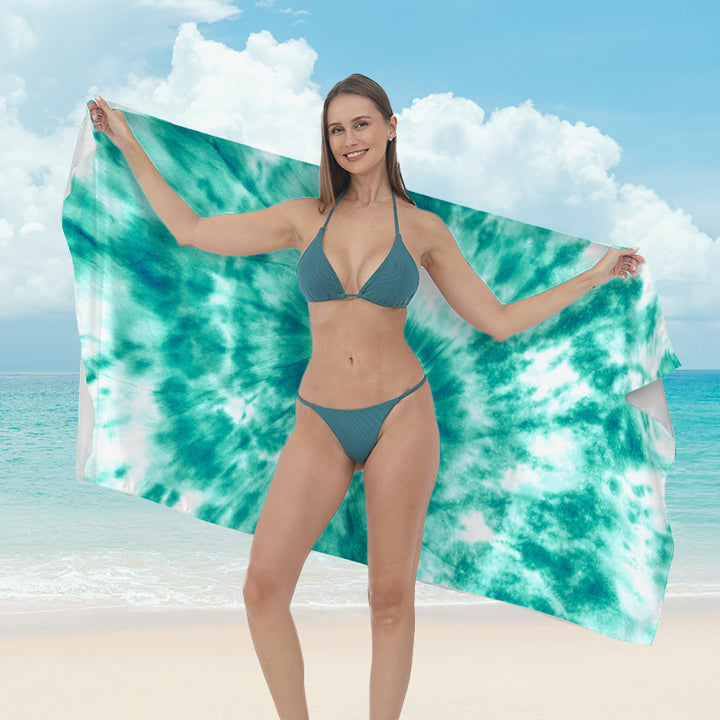 Beach towel with vibrant tropical plant motif Kalsten
