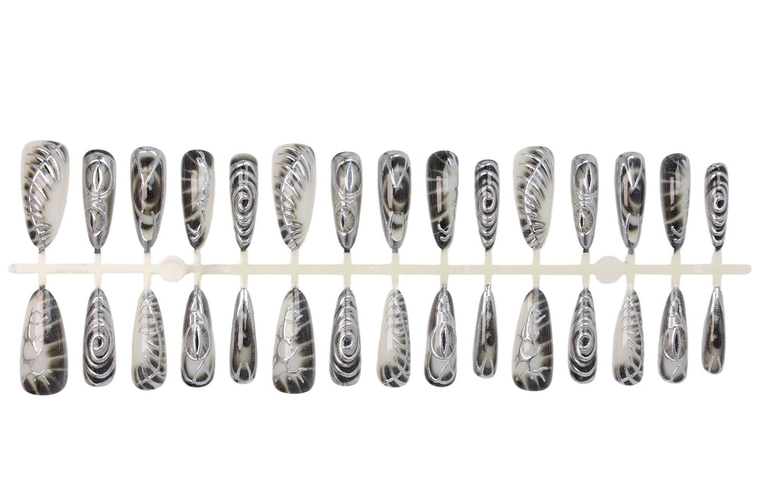 Artificial nail set with modern spiral pattern and shiny accents Kalsten