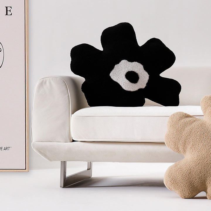 Form cushions made of bouclé with organic sculpture look and contrasting center application