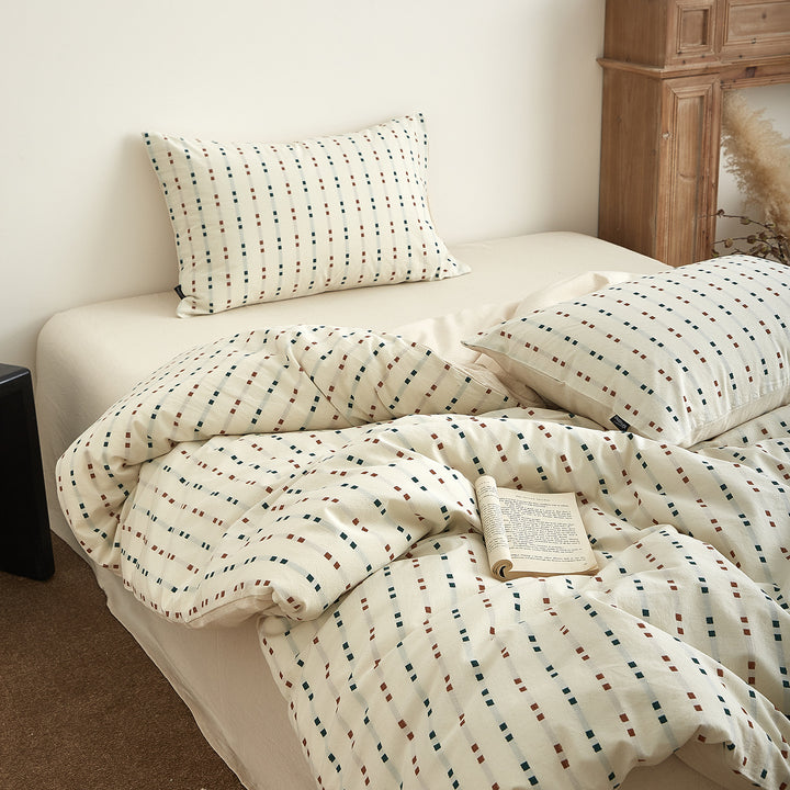 Bedding set made of cotton percale with fine geometric dot stripes