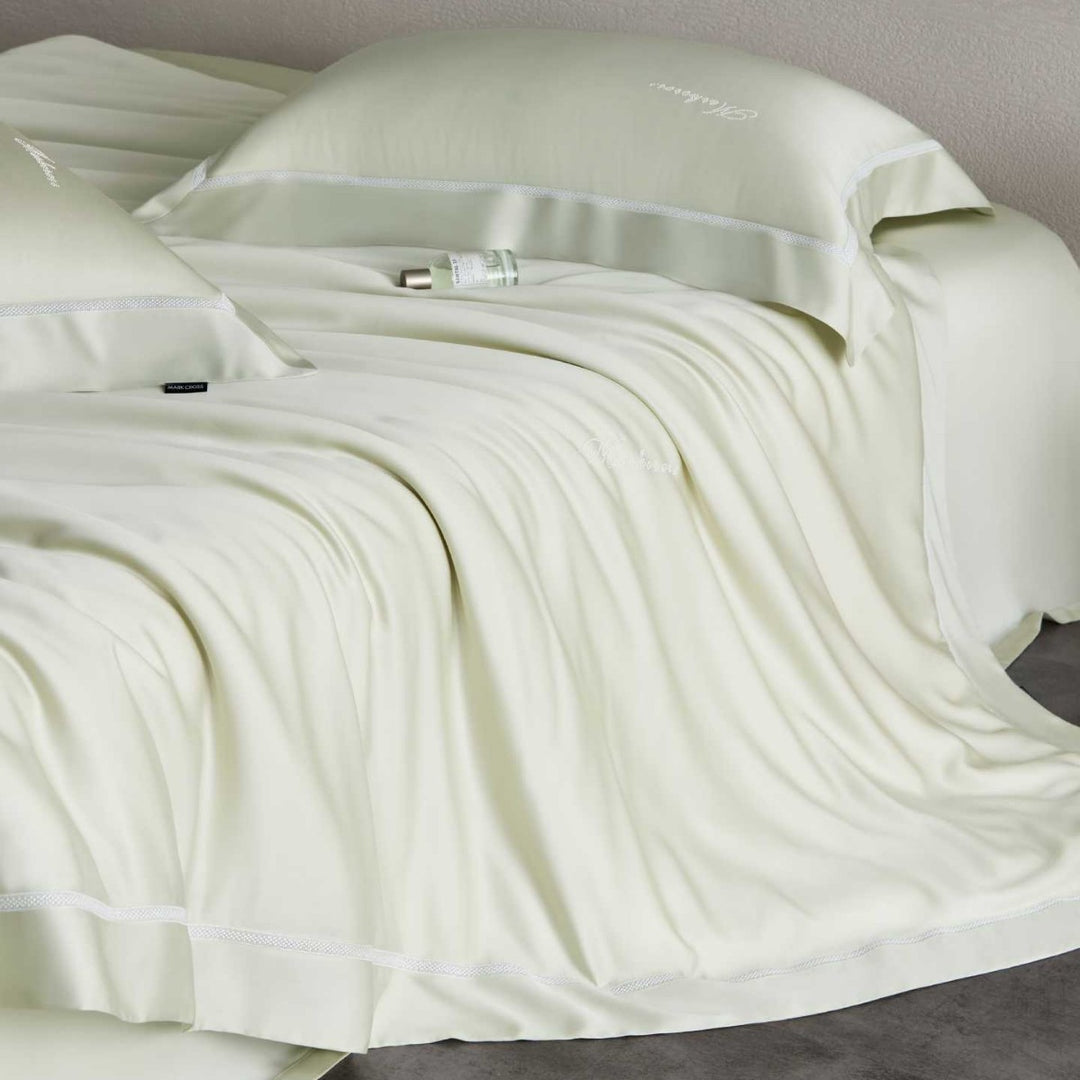 Silky-smooth cotton satin bedding set with fine decorative ribbon and pillowcases