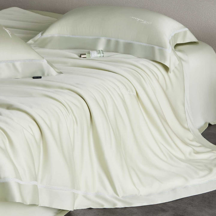Silky-smooth cotton satin bedding set with fine decorative ribbon and pillowcases