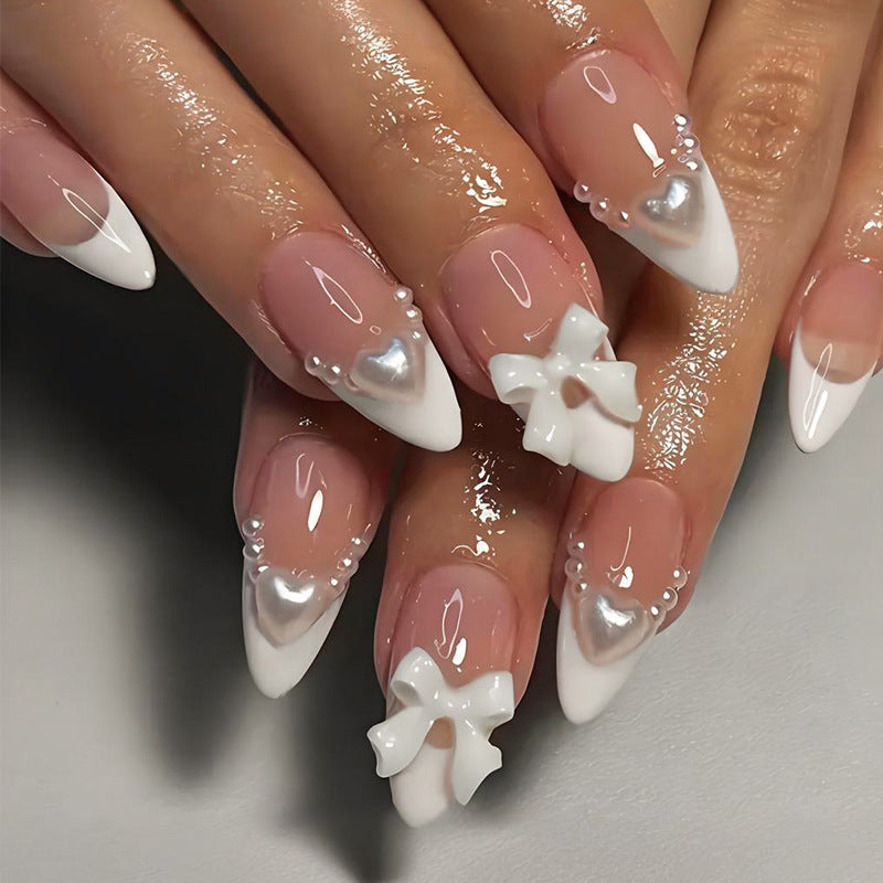 Art nail set with romantic bow and heart decorations Kalsten