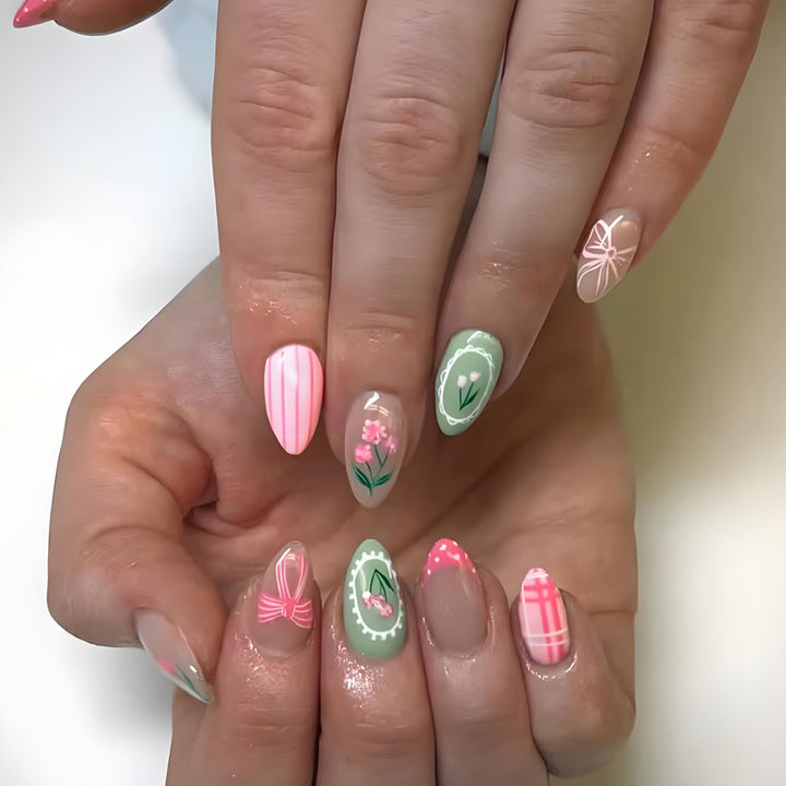 Acrylic nail set with floral and playful designs Kalsten
