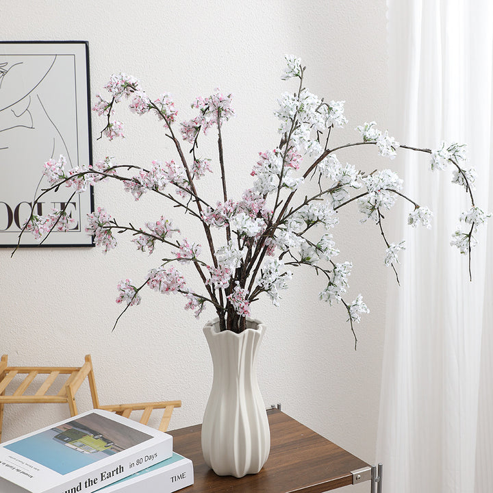 Artificial cherry blossom branch with lifelike details