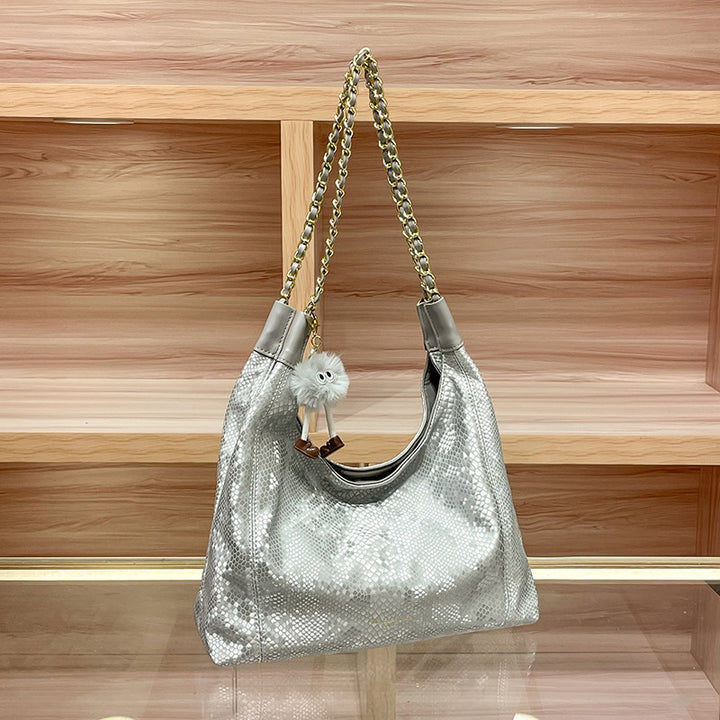 Chic Shoulder Bag with Decorative Charm