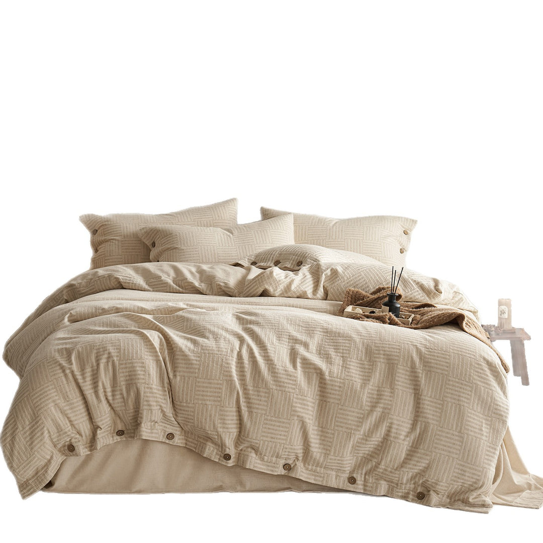 Reversible cotton bedding set with button closure and subtle geometric jacquard