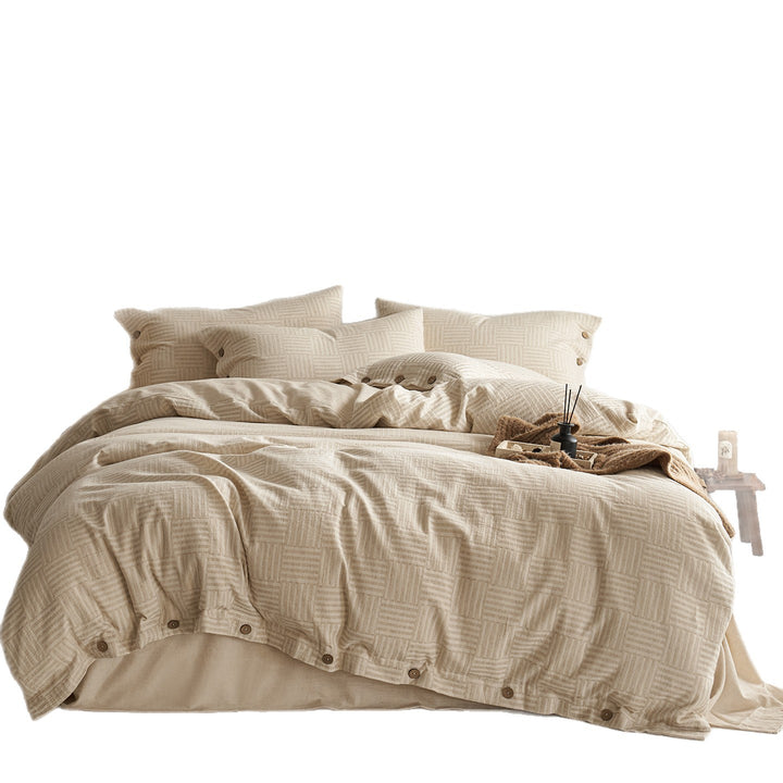 Reversible cotton bedding set with button closure and subtle geometric jacquard