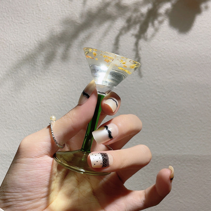 Artistic Press-On Nail Design with Lace and Polka Dots