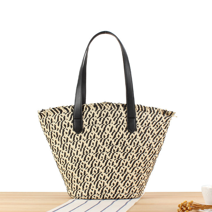 Stylish leisure tote bag made of braided natural material Kalsten