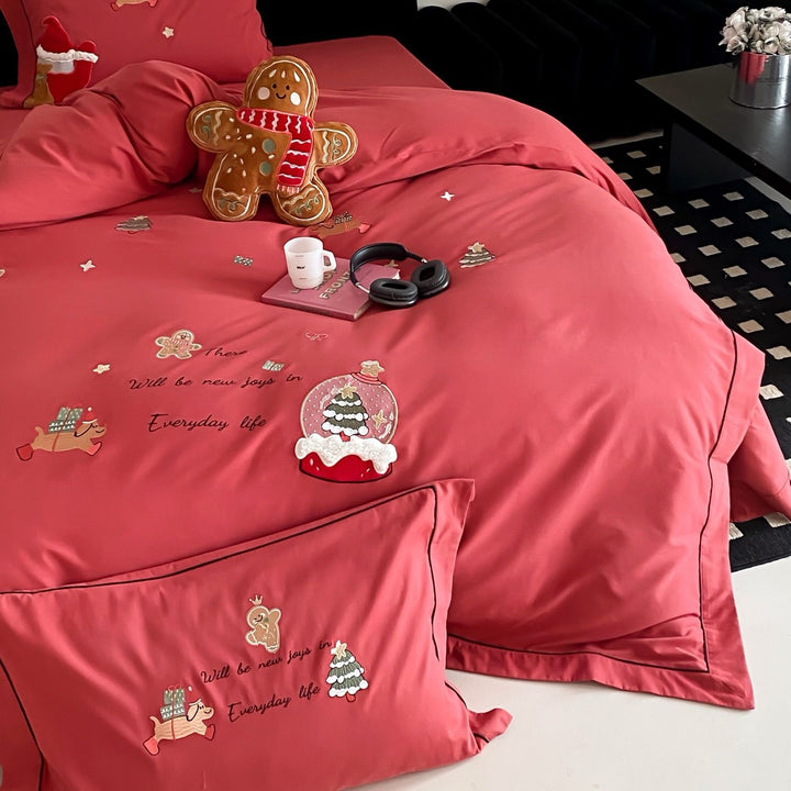 Festive cotton satin bedding set with embroidered Christmas motifs and contrasting borders
