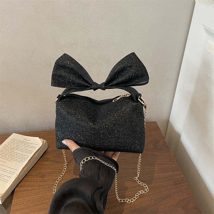 Bow-Accented Sparkling Handbag