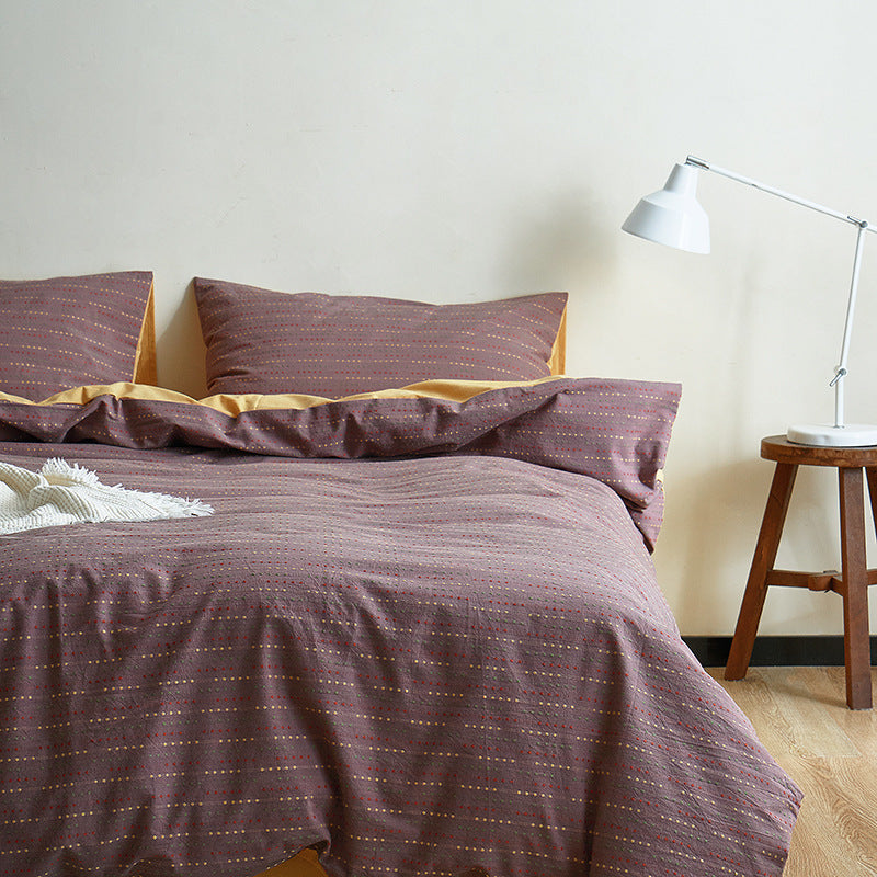 Reversible bed linen set made of breathable cotton blend with fine dot texture