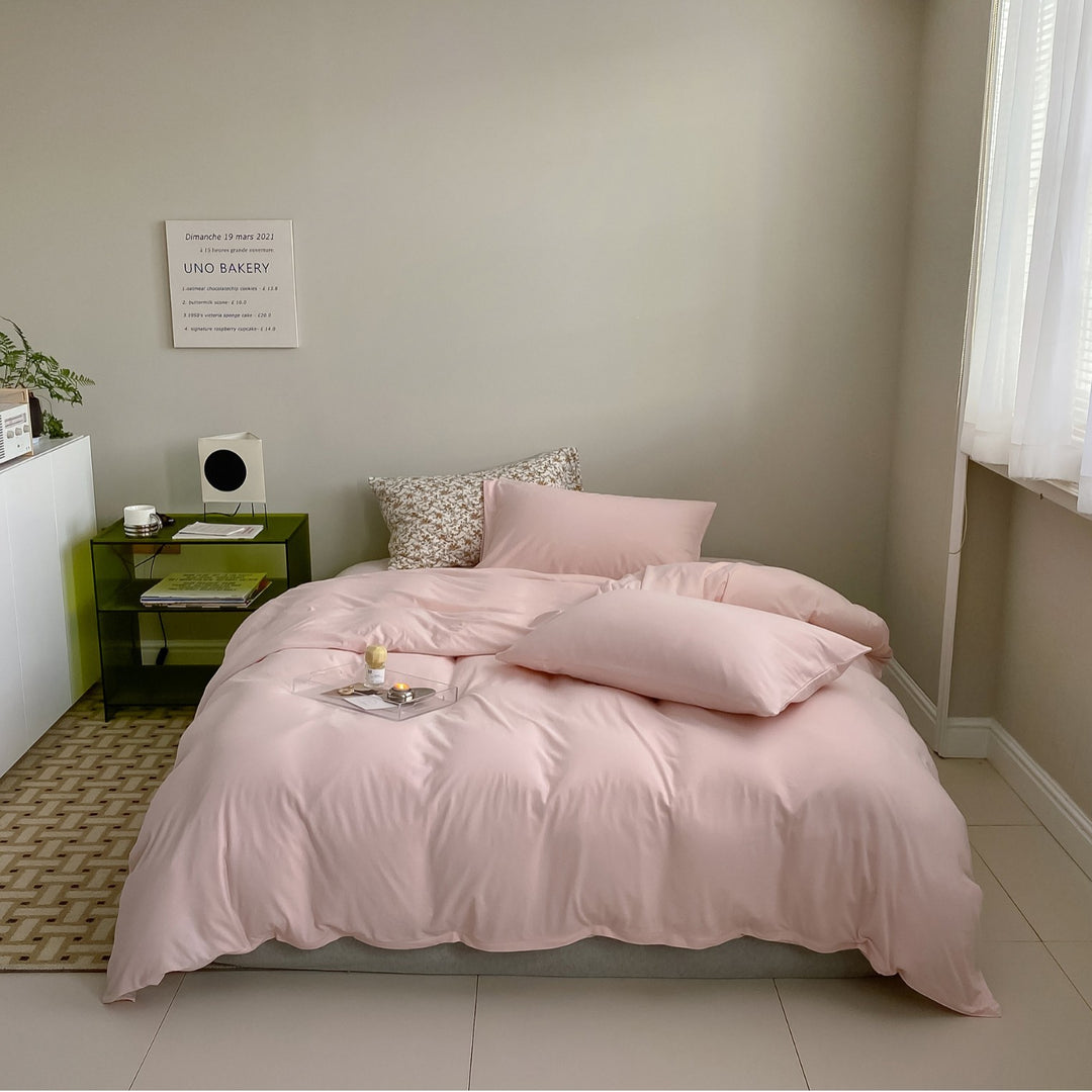 Minimalistic duvet cover set made of skin-friendly cotton blend with soft fiber filling