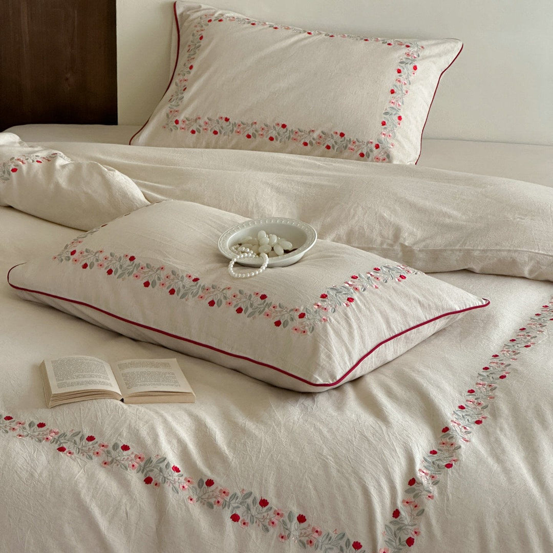 High-quality cotton-linen bed linen set with fine floral embroidery and piping edge