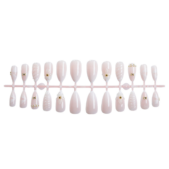 Artificial nail set with elegant floral design and luxurious accents Kalsten