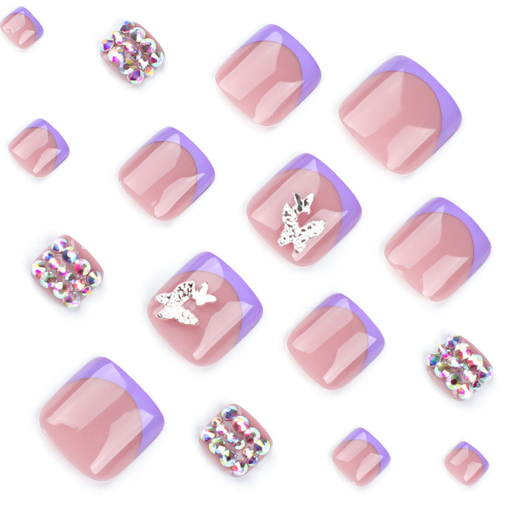 Artful toenail art with elegant glitter decorations Kalsten