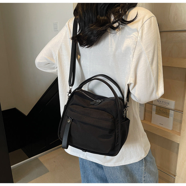 Fashionable shoulder bag with innovative structure and detachable carrying strap Kalsten